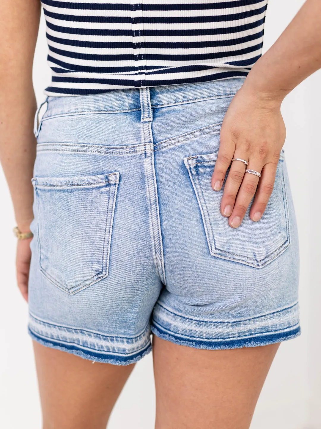 Cadence High Rise Distressed Hem Denim Shorts